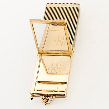 A Cartier Art Deco Vanity Case/Minaudière in 18K gold, black enamel and onyx.