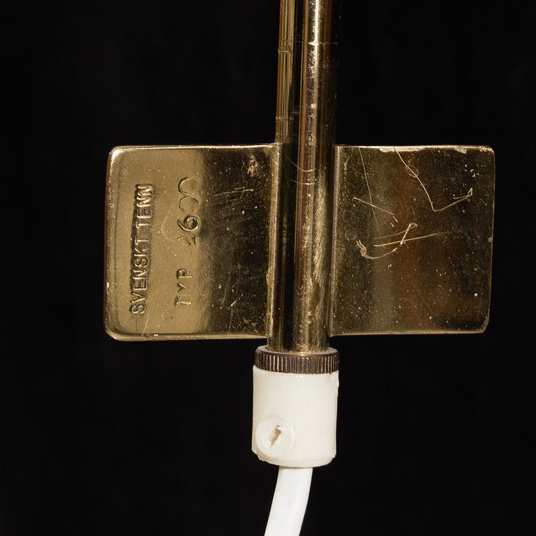 A model 2600 brass wall lamp by Josef Frank for Firma Svenskt Tenn.