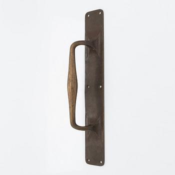 An Art Nouveau door handle from early 20th century.