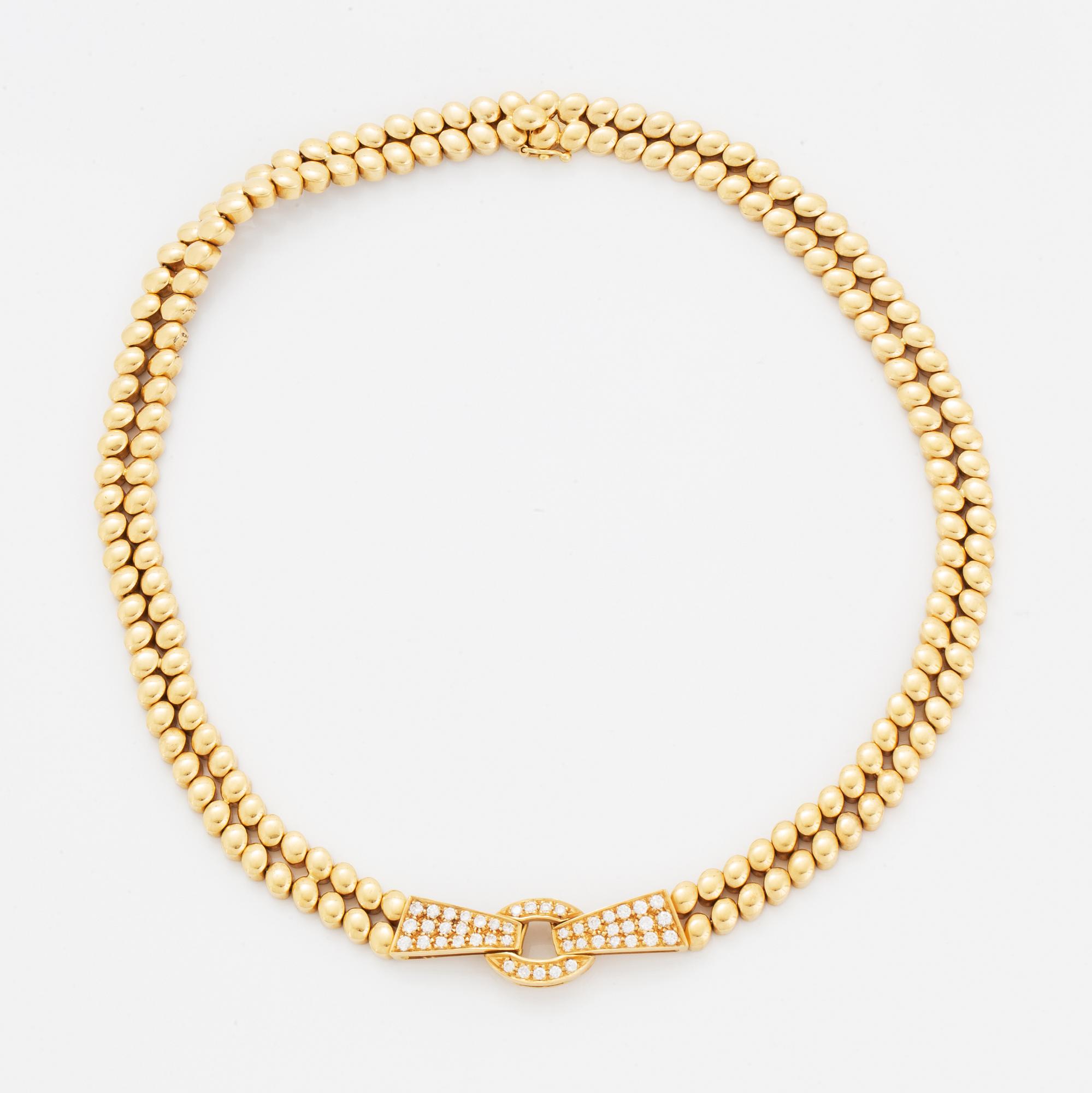 An 18K gold necklace and bracelet.
