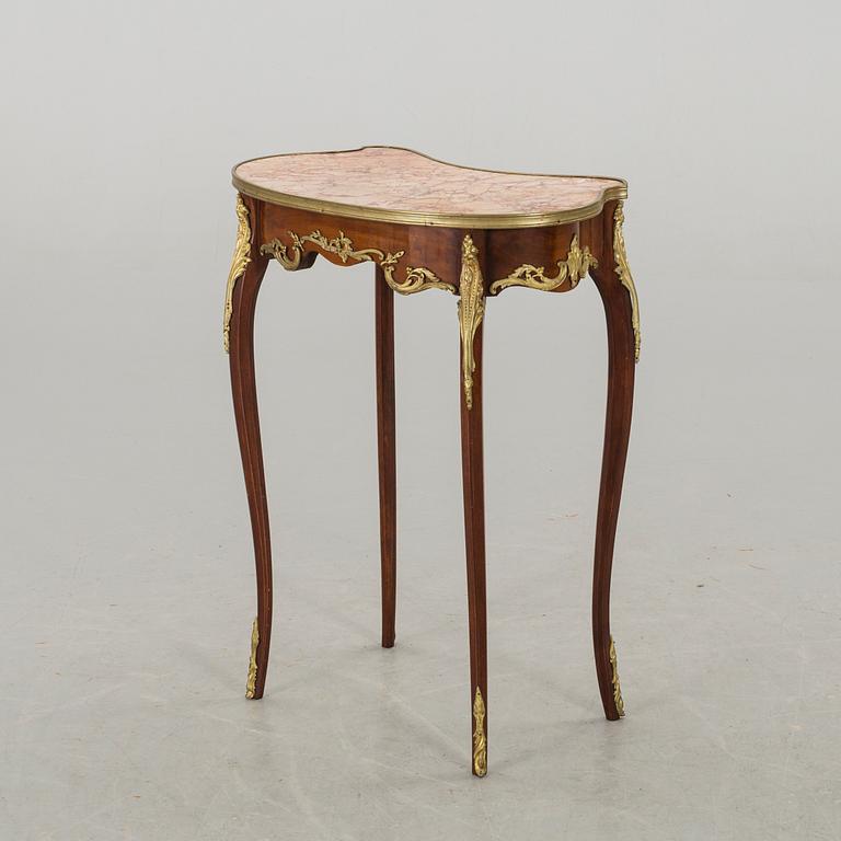 A NEO ROCOCO SIDE TABLE.