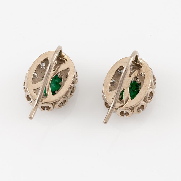 Earrings, carmosé. white gold with emeralds and brilliant-cut diamonds.