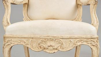 A pair of Swedish Rococo 18th century armchairs attributed to Carl Magnus Sandberg (master in Stockholm 1759-1789).