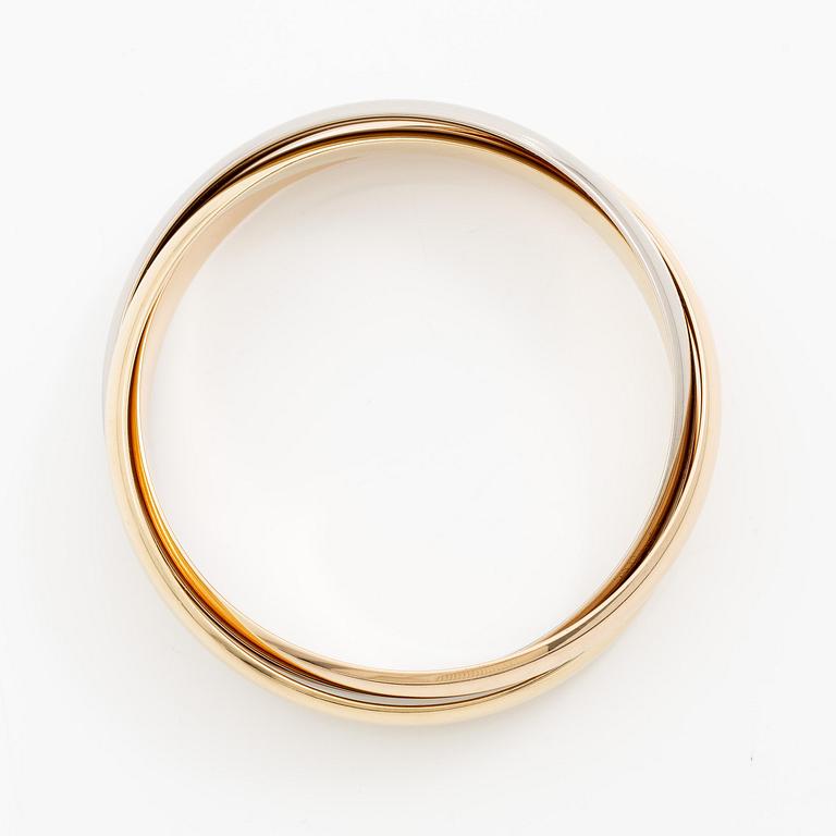 Cartier a bracelet "Trinity" 18K gold in three different colours.