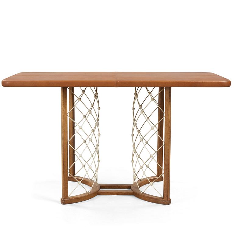 A modernist oak based table, 1940-50's.