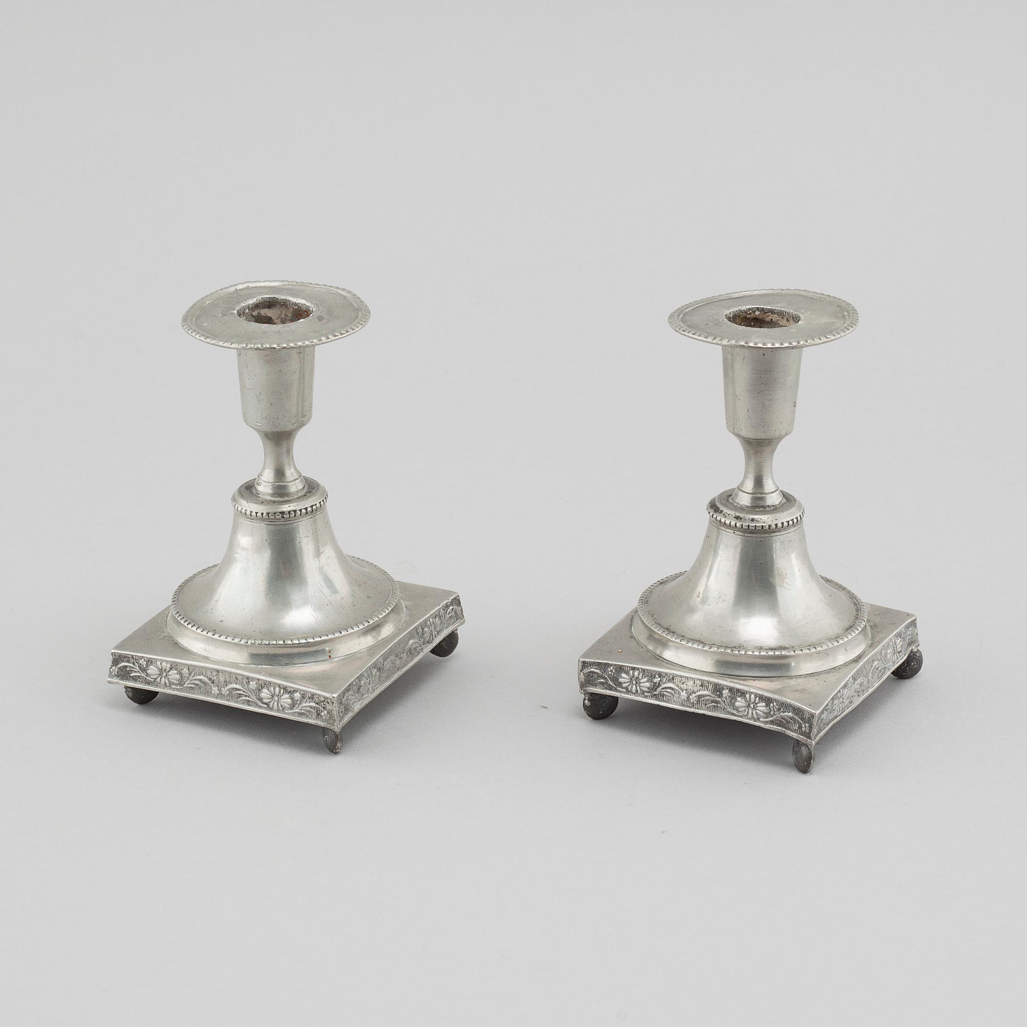 A pair of pewter candlesticks, probably by Gustaf Frederic Wigholm in Eskilstuna, first half of the 19th century.
