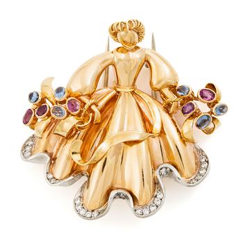 587. Brosch 18K guld med åttkantslipade diamanter samt safirer.