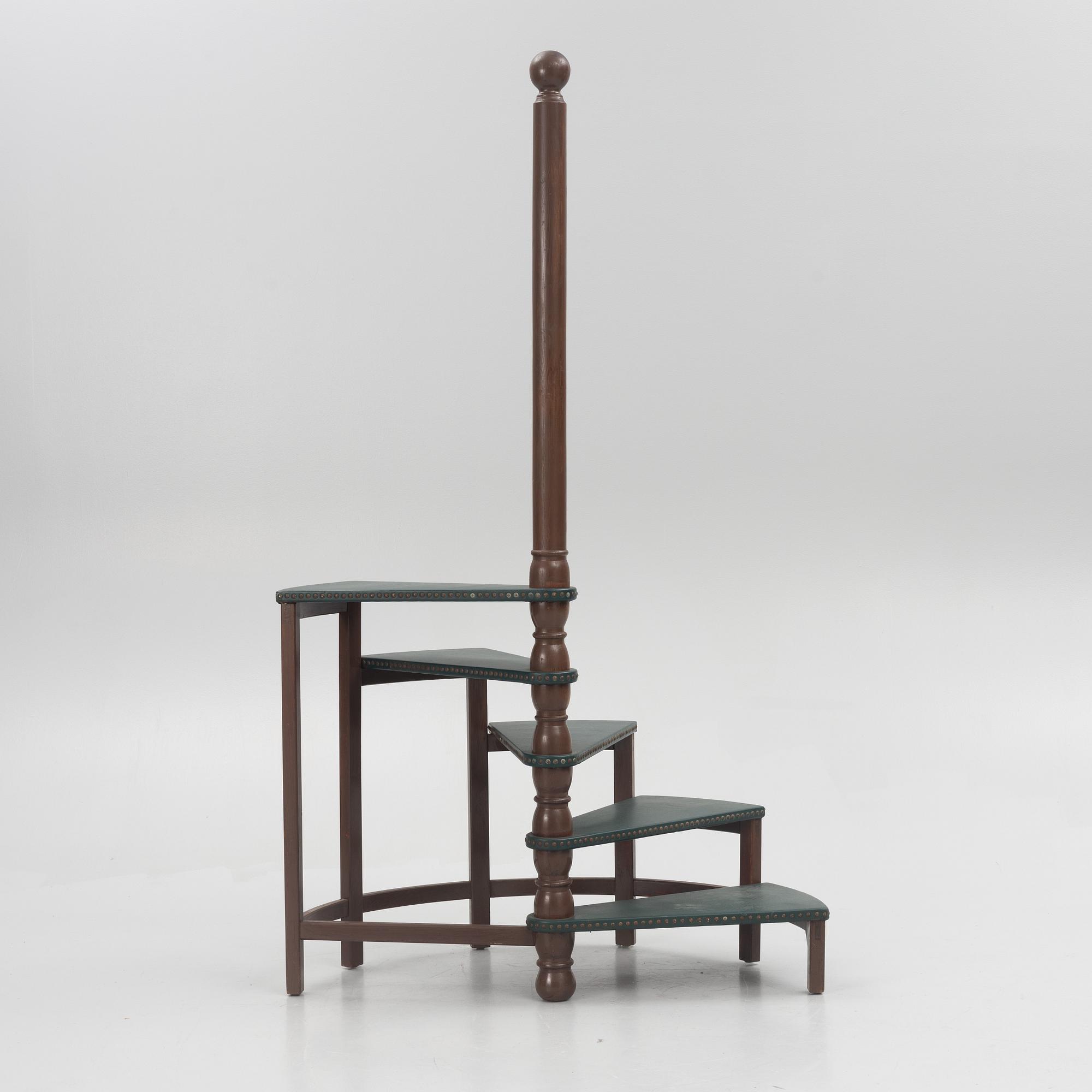 Amid 20th century library ladder.