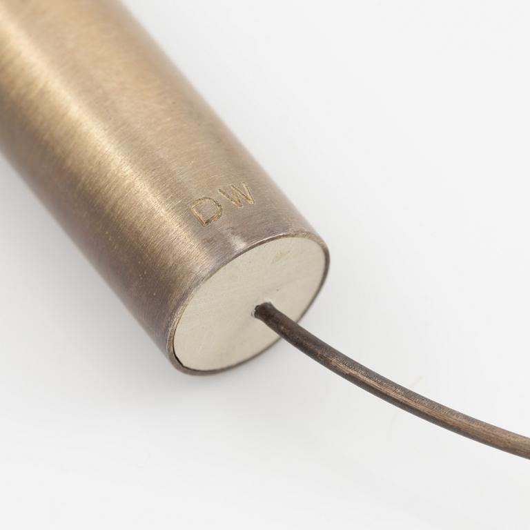 Dan Wolgers, collier med vattenpass.