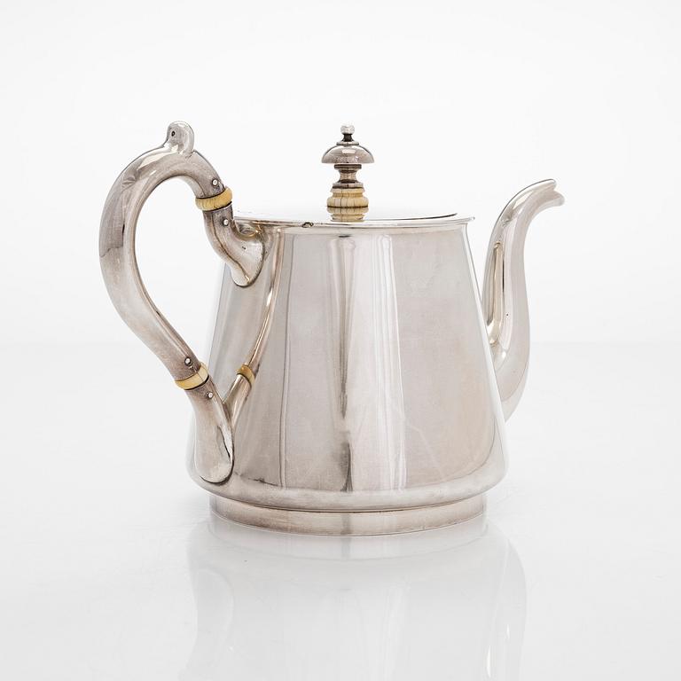 A 19th-century parcel-gilt silver teapot, maker's mark of Johan Heinoin, Saint Petersburg 1878.