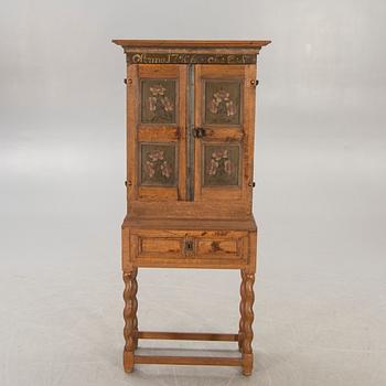 An oak cabinet dated 1786.