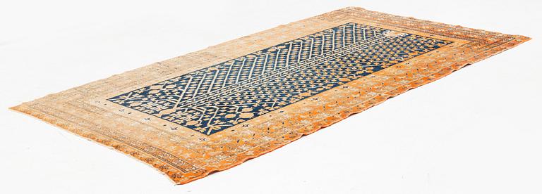 An antique Khotan carpet, Xinjiang area, China, ca 272 x 155 cm.