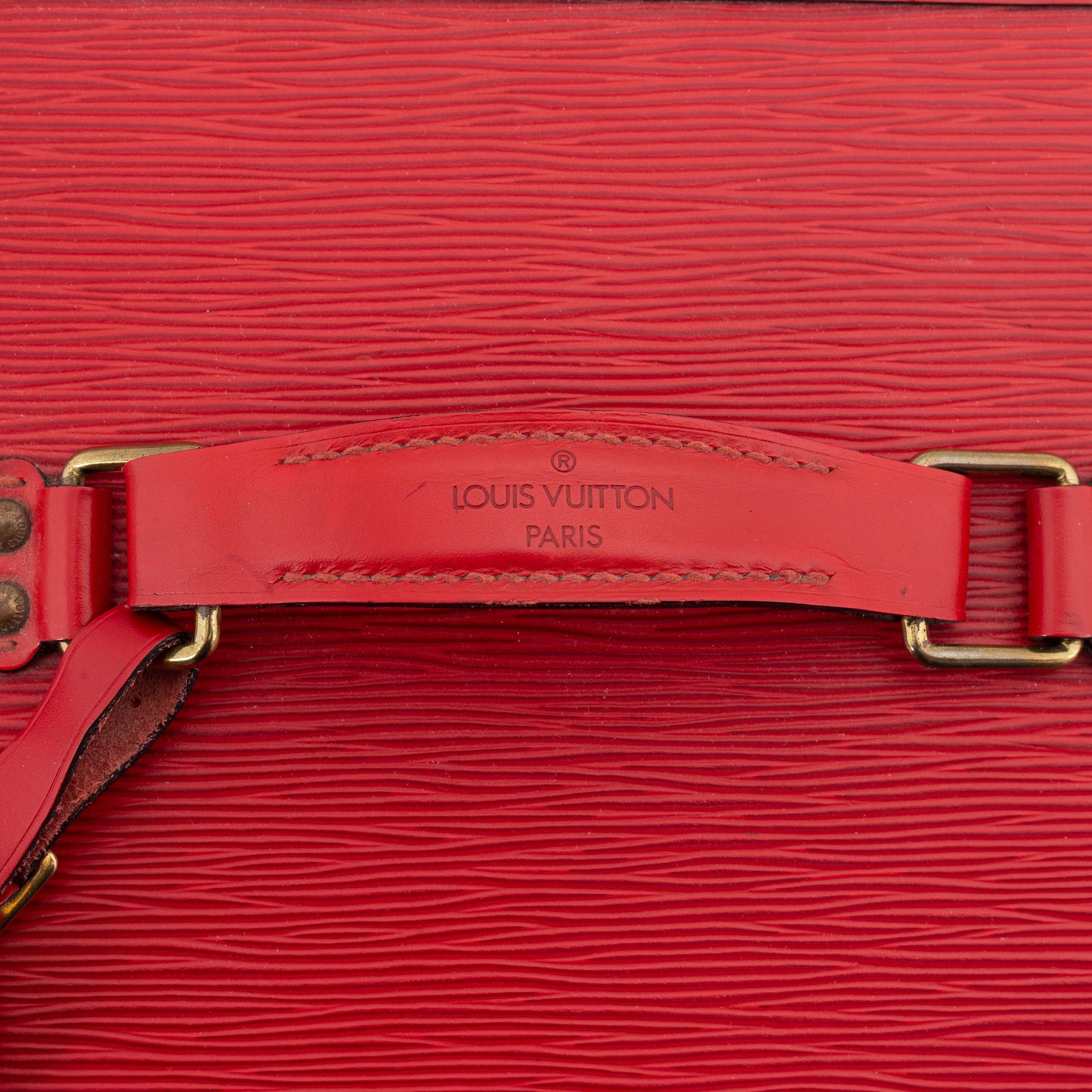 Louis Vuitton, a red Epi beauty box.