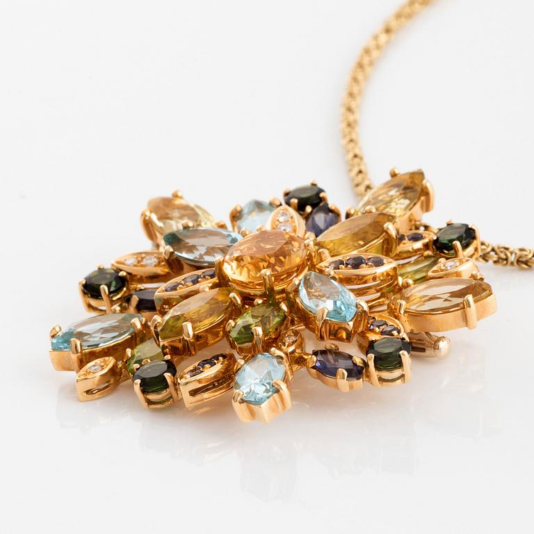 A brooch/pendant in 18K gold set with colored stones, Mangiarotti.
