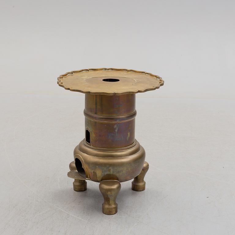 A Chinese brass stove, Qing, circa 1900.
