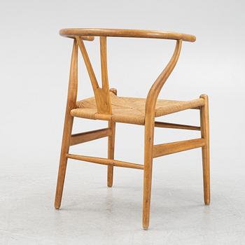 Hans J Wegner, a model 'CH 24' beech chair, Carl Hansen & Son, Odense, Denmark.