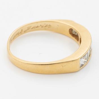 14K gold ring with princess-cut diamonds.