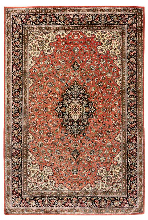 A 1960's silk Qum carpet, c. 305 x 205 cm (as well as 4 and 2 cm of flat weave on each side).