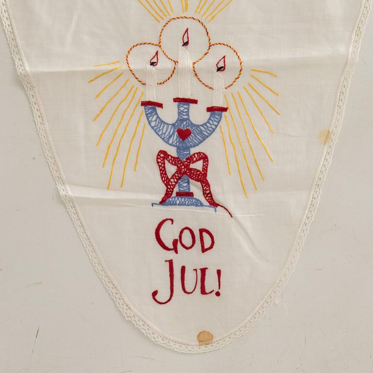 A collection of smaller Christmas tablecloths, runners, and wall hangings, approximately 34 pieces, mid/second half of the 20th century.