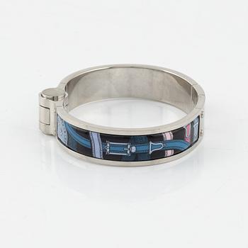 Hermès, a metal and enamel cuff.