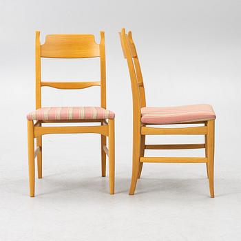 Carl Malmsten, a dining table with eight chairs, 'Camlare Nyckel', Sweden, second half of the 20th century.