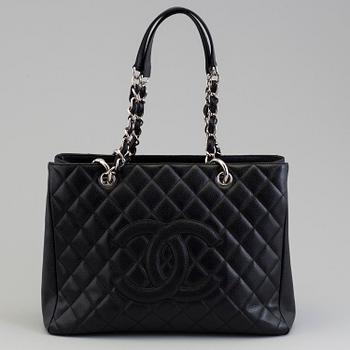 A black caviar "Shopper tote bag" by Chanel 2017.