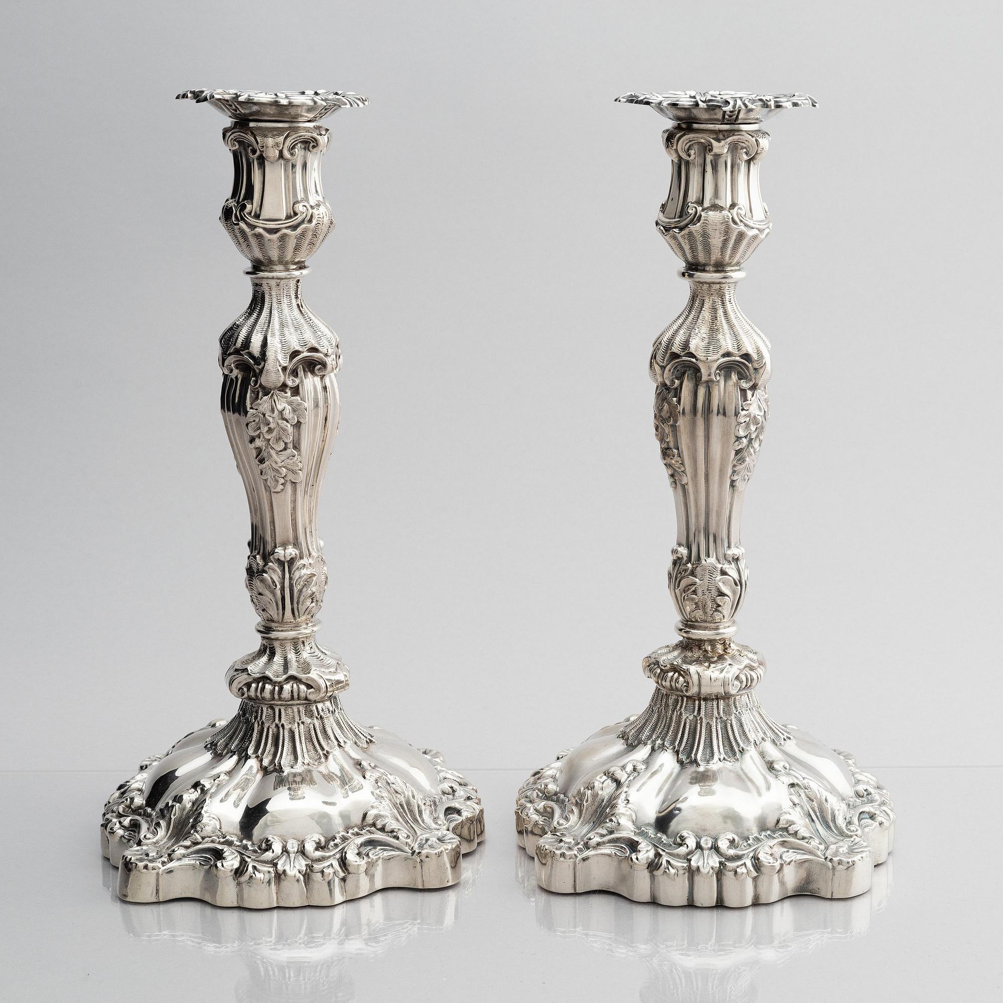 A pair of silver candlesticks, marks Gustaf Möllenborg, Stockholm 1845.