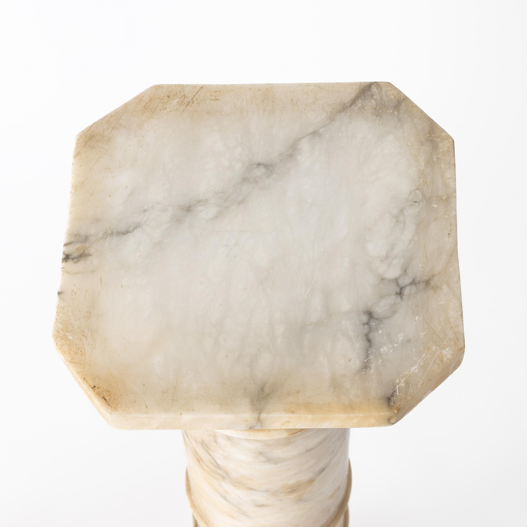 A table lamp on a pedestal, early 20th Century.