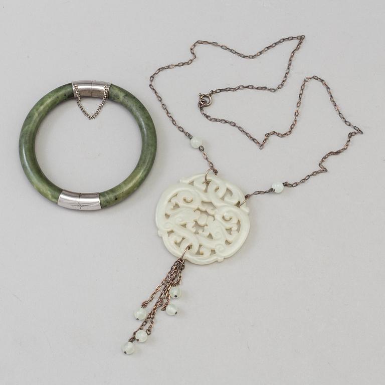 A Chinese armband and a pendant, 20th Century.