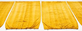 A set of four yellow velvet curtains, 1910's/20's, ca 247 x 120 cm.