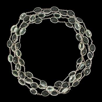 A long green quartz necklace.