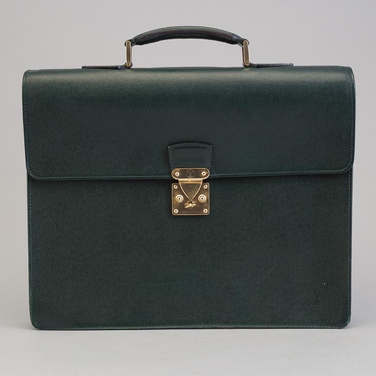 A Louis Vuitton green taiga Ambassador Briefcase.