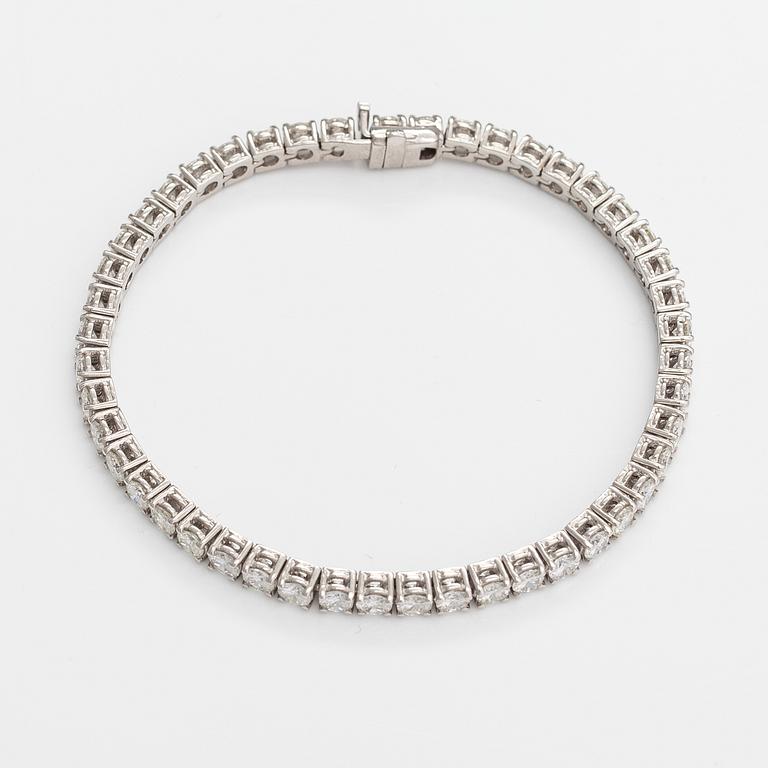 Tennisrannekoru, 18K valkokultaa, briljanttihiottuja timantteja n. 7.00 ct yht.