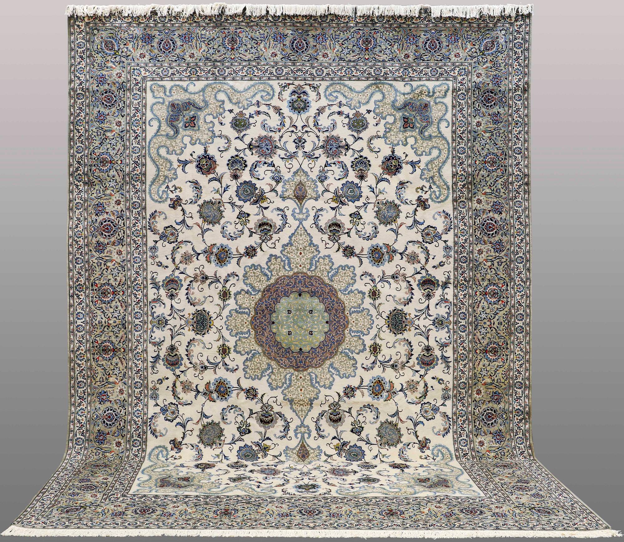 A signed so called Royal Kashan carpet, ca 432 x 313 cm.