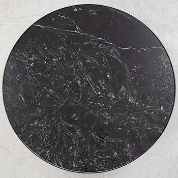A marble top coffe table by Ferm Living, Denmark.