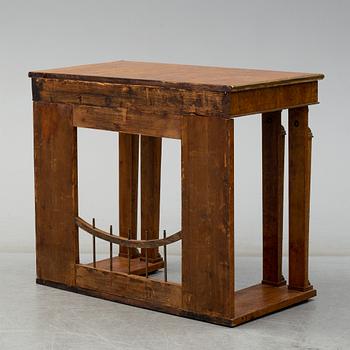 An early 19th century console table.