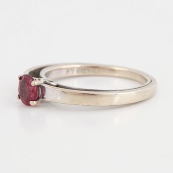 A tourmaline and brilliant cut diamond ring.