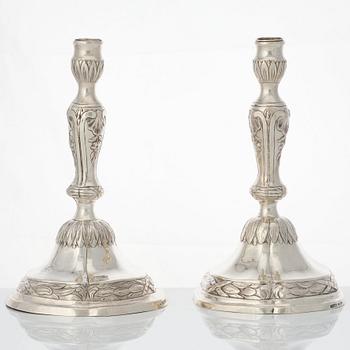 A matched pair of 18th century silver candlesticks, mark of Isak Trybom, Stockholm 1775 and.