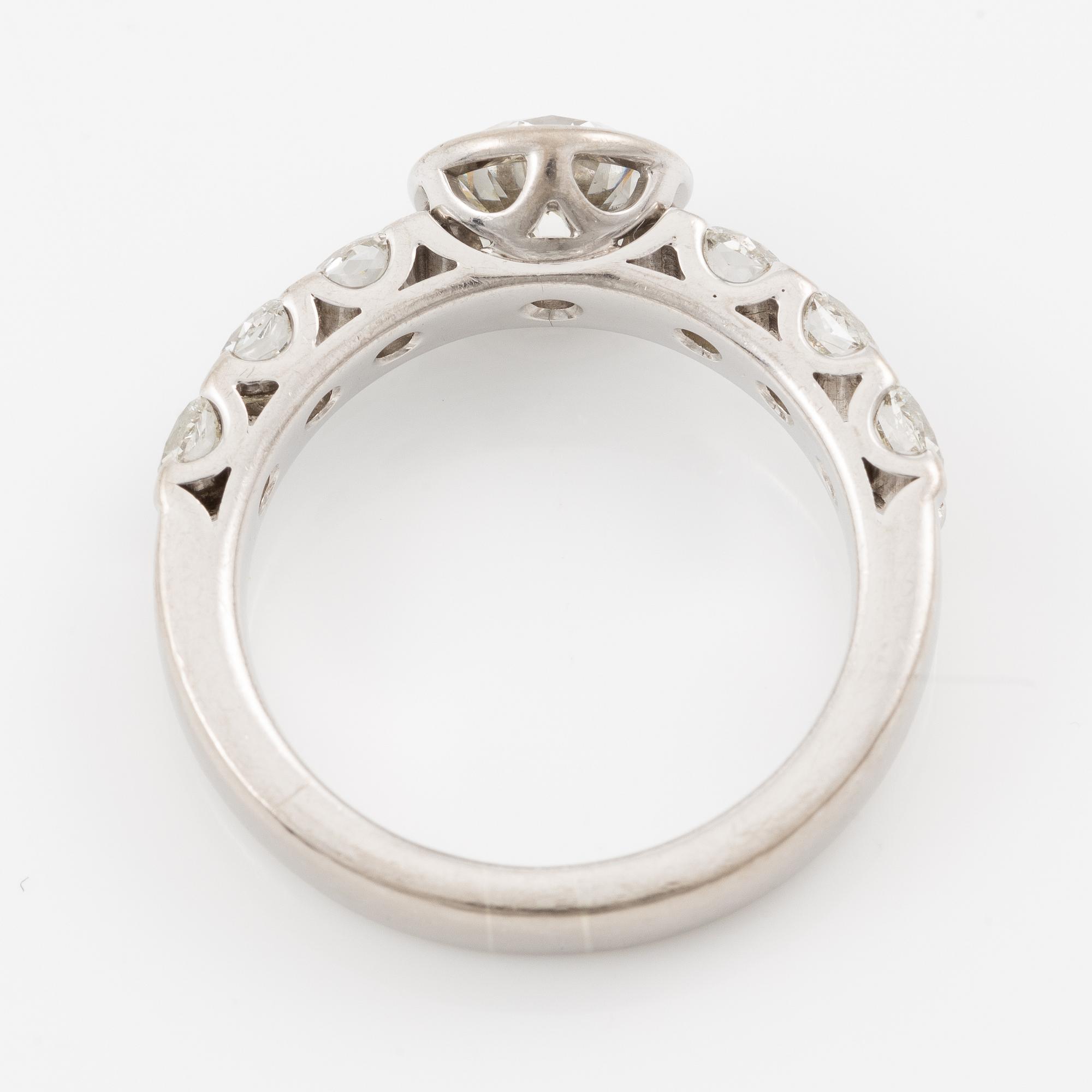 Ring, Atelier Ajour, 18K white gold with a brilliant-cut diamond approximately 1 ct with old mine-cut diamonds.