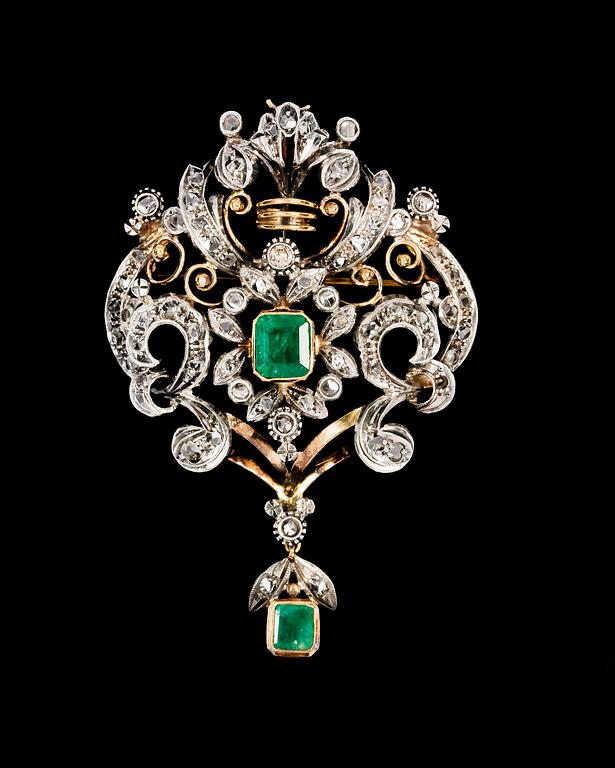 BROOCH, brilliant- and rose cut diamonds and emeralds.