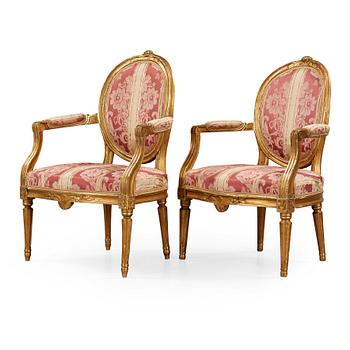 534. A matched pair of Gustavian late 18th cenury armchairs.