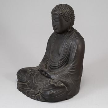 A Japanese buddha sculpture, late 20th Century.