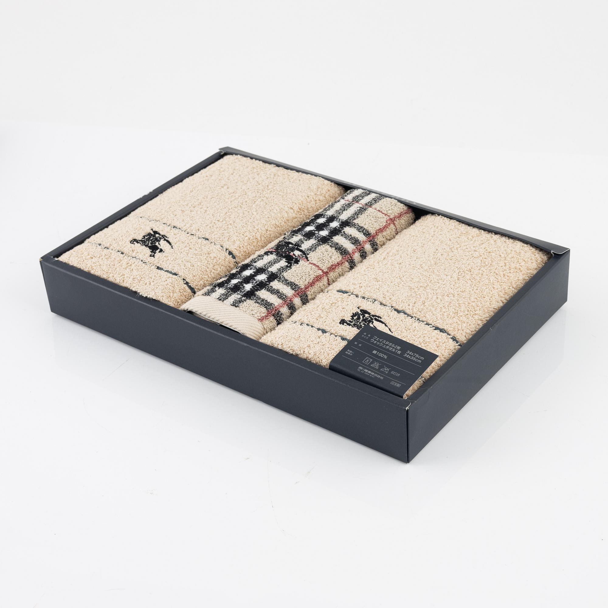 Burberry, a set of three towels.