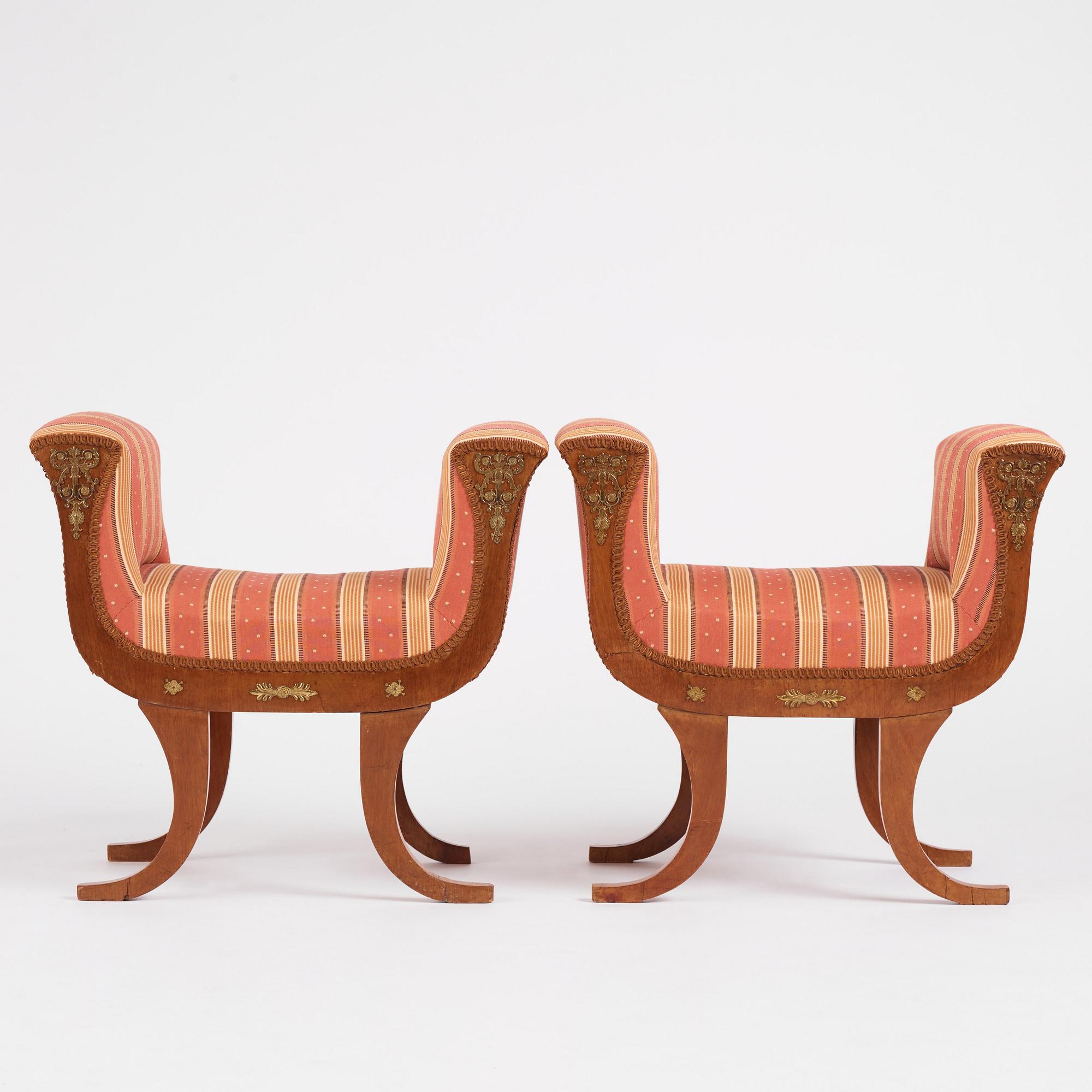 A pair of Swedish Royal Empire stools.
