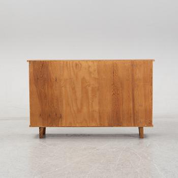 A teak book case. Second half of the 20th Century.