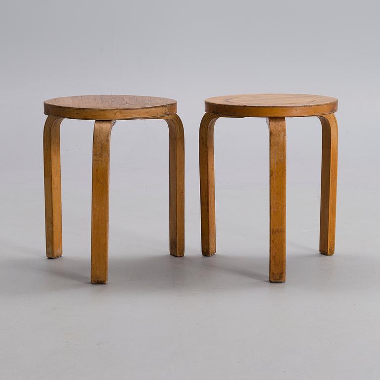 ALVAR AALTO, A PAIR OF STOOLS.
