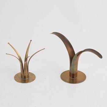 Ivar Ålenius-Björk, four brass candlesticks, Ystad Metall, mid 20th century.