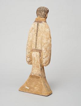 A painted pottery figure of a court attendant, Han Dynasty (206 BC-220 AD).