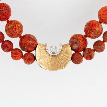 OLE LYNGGAARD, coral bead necklace, clasp with diamond.