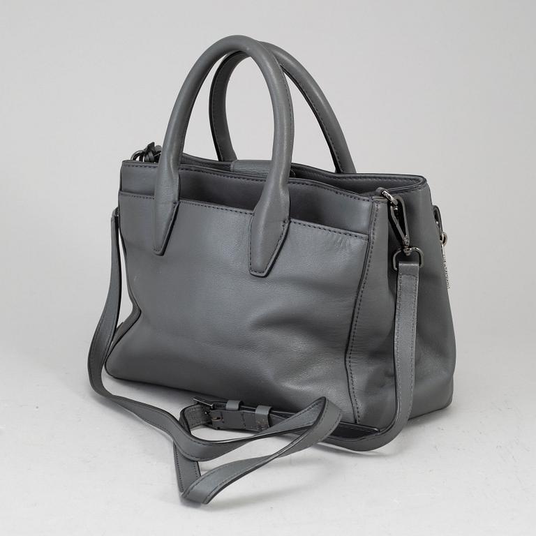 DIANE VON FÜRSTEBERG, a grey leather 'DVF Secret Agent' bag.